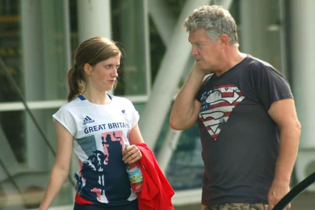 Coach Joe McDonnell saw a fierce competitive streak in Sophie at their first meeting EMN-160825-102641002
