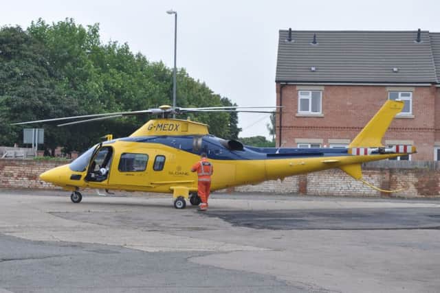 Air ambulance lands in Thorpe End, Melton. Photo: Jonathan McGrady/JM News