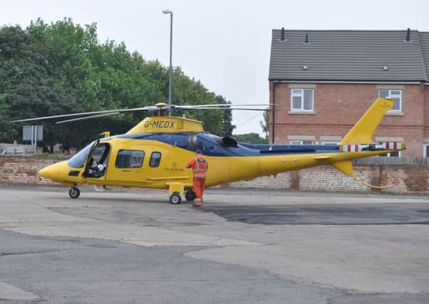 Air ambulance lands in Thorpe End, Melton. Photo: Jonathan McGrady/JM News