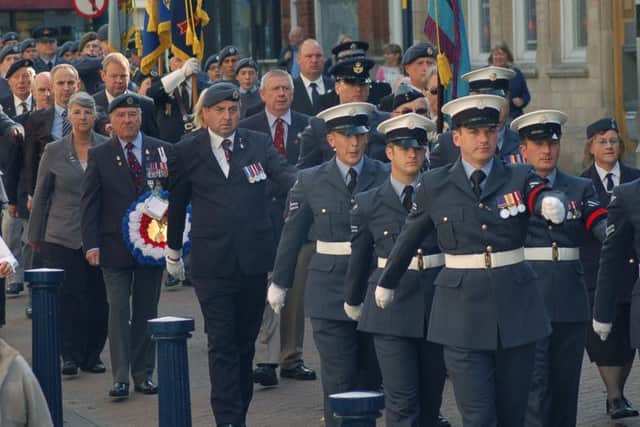 Last year's Battle of Britain parade in Melton marches down High Street en route to the Memorial Gardens EMN-151009-184950001
