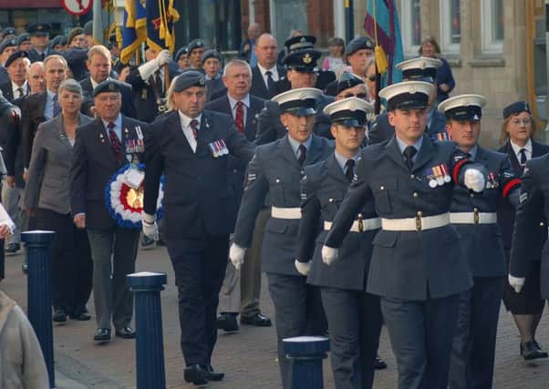 Last year's Battle of Britain parade in Melton marches down High Street en route to the Memorial Gardens EMN-151009-184950001