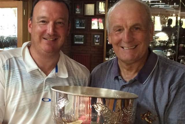 Duncan Bradshaw presents the Bagshaw Bowl, in memory of his father, to 2016 winner Phil White EMN-160829-172654002