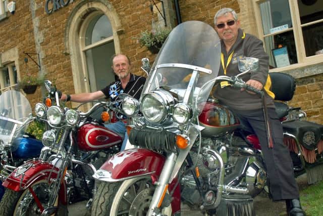 Landlord Alan Edmonds and Bob Wood from the Air Ambulance sit astride classic Harley Davidsons PHOTO: Tim Williams