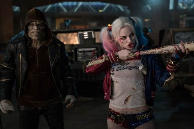 Adewale Akinnuoye-Agbaje as Killer Croc and Margot Robbie as Harley Quinn
PHOTO: PA Photo/Warner Brothers