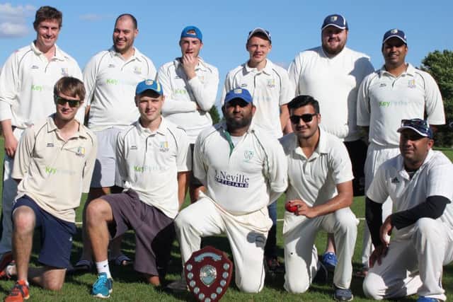 Queniborough pose with the Golding Shield, from left, back - Will Vamplew, Richard Lowe, Sam Payne, Callum Smith, James Vamplew, Nilesh Patel; front  Jim Payne, Hayden Whitaker, Ram Bapodra, Uday Bapodra, Praful Patel PICTURE: Mick Wiseman EMN-160109-162459002
