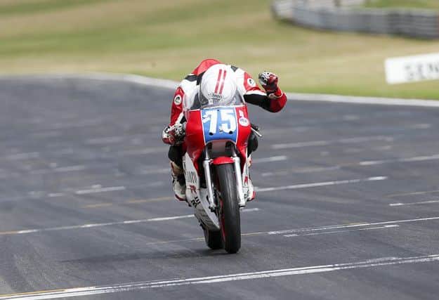 Hart punches the air as he wins with the TZ 350 EMN-160609-172440002