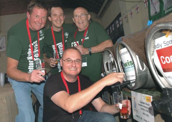 CAMRA crew Paul Wilson, Andrew Wilson,Pete Wilkinson and Harvey Hopwood kept the beers flowing at last year's event  
PHOTO: Tim Williams