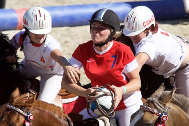 Abbie Gibson in action for Great Britain at the Ladies' Horseball World Cup EMN-160909-165343002
