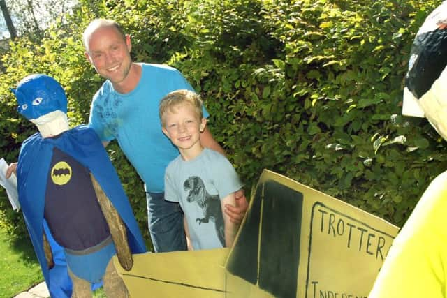 Seven-year-old Jack Pell and dad Joe visit Del Boy and Rodney Trotter PHOTO: Tim Williams