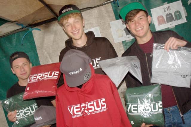 Versus co-owner Joe Twelvetree and friends Nathan Cridland and Matthew Creighton on their stall PHOTO: Tim Williams