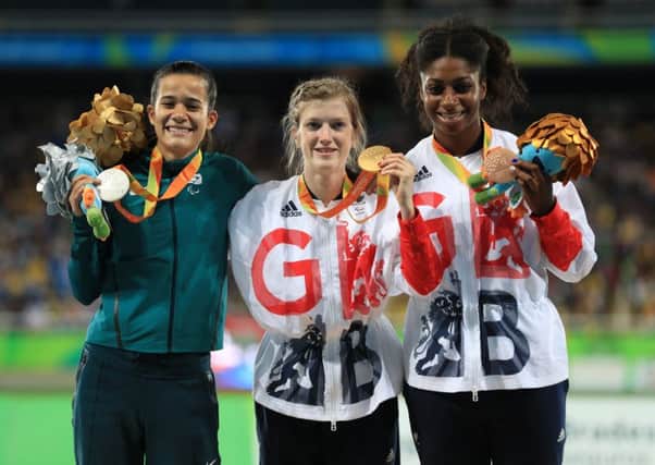 Sophie Hahn on the top step of the podium flanked by good friend Veronica Hipolito (left) and GB team-mate Kadeena Cox PICTURE: Adam Davy/PA EMN-160914-093817002