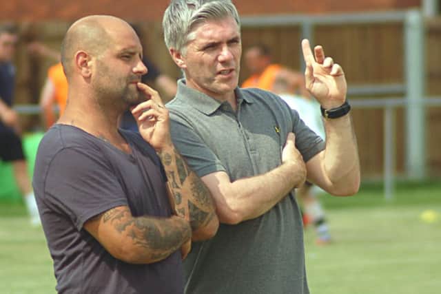 New Melton Town boss Tony Thorpe (right) mulls things over with assistant manager Ross Perkins EMN-160921-110041002
