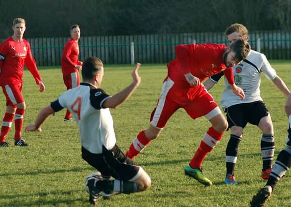 Adam Bishop, in action last season against Friar Lane, who was  on target for Melton Town against Long Buckby EMN-160927-162232002