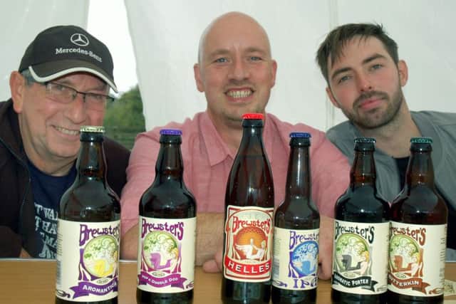 Brewsters barmen Paul Sellars, James Granger and Niall Pearce line up the beers PHOTO: Tim Williams