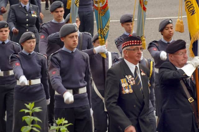 Royal British Legion representatives and Air Cadets enter the Memorial Gardens EMN-160920-113811001