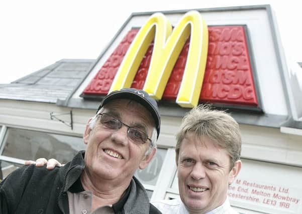 Melton Mcdonald's franchisee Martin Cuthbert with a member of staff