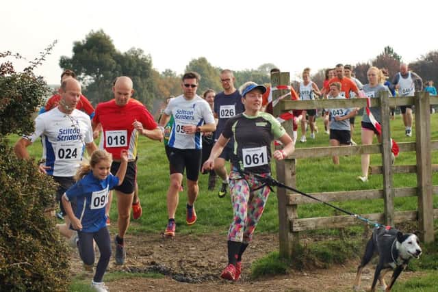 Runners and walkers head off into the countryside from the start at Vine Farm in last year's Great Dalby Dollop EMN-160925-130303001