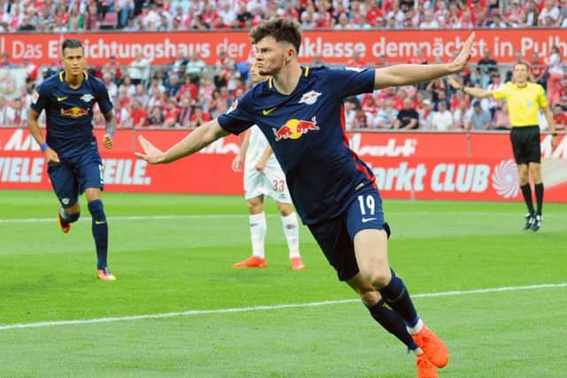 Oliver Burke celebrates scoring the opening goal on his full Bundesliga debut for Red Bull Leipzig against Cologne.
PHOTO: DPA / DPA/PA Images EMN-160927-142150002