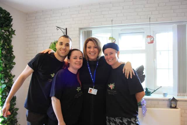 Staff celebrate the opening of the new 'Memories Cafe' at Belvoir Vale Care Home at Widmerpool EMN-160410-155015001