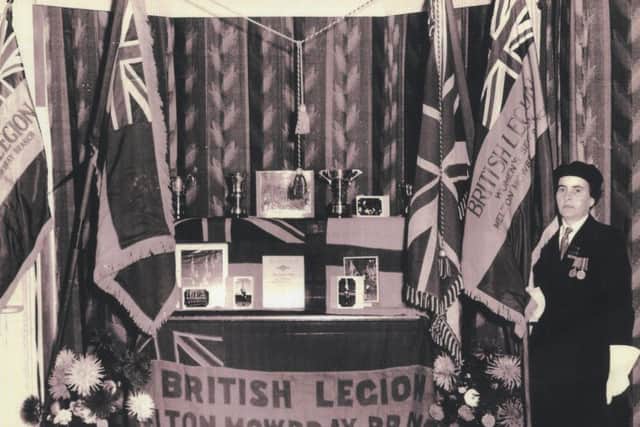 This old photo shows the late Margery Brutnell MBE in the early years of her dedicated service as a standard bearer with the Melton Royal British Legion Women's Section. Margery, who died last year at the age of 94, was awarded the MBE from the Queen in 2002 for her long and dedicated service having then served 52 years with the Legion EMN-160930-155622001