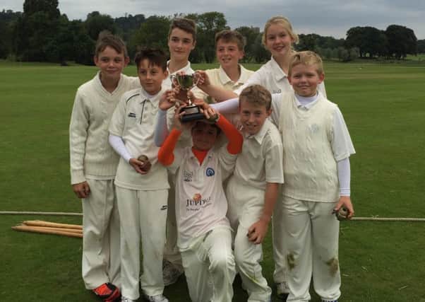 Belvoir CC Under 11s celebrate the league and cup double EMN-160410-182523002