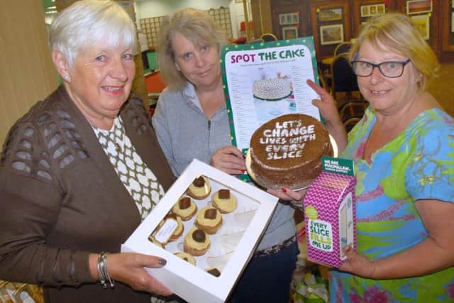 Valerie Drewery, Jenny Marshall and Julie Roberton ran a Spot the Cake competition at Melton Bowls Club. They raised Â£470 PHOTO: Tim Williams