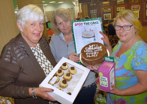 Valerie Drewery, Jenny Marshall and Julie Roberton ran a Spot the Cake competition at Melton Bowls Club. They raised Â£470 PHOTO: Tim Williams