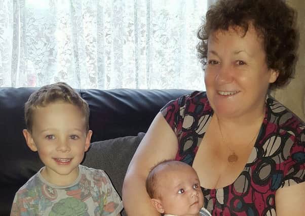 Jeanette Bateman, who has passed away aged 58, pictured with grandchildren Jordon (4) and 10-week-old Jamie EMN-161110-162913001