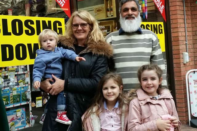 The Stork owner Harun Jussab, who is closing the Melton shop after 30 years, with one of his longest standing customers Anita Smith and her grandchildren, Freddie (1), Mollie (8) and six-year-old Daisy EMN-161019-124246001