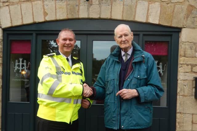 Chief superintendent Andy Lee and Sir Lyonel Tollemache, owner of Buckminster Estate at the opening of the new police office.