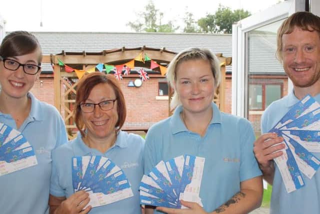 Rainbows Hospice care team members Michelle Oldfield, Wendy Kaye, Gemma McLoughlin and Julian Fletcher with the Big Christmas Raffle tickets.