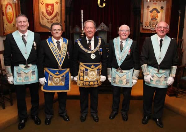 The Provincial Grand Master of Leicestershire and Rutland David Hagger (centre) along with the Master, Wardens and Secretary of The Rutland Lodge. Photo: Andy Green