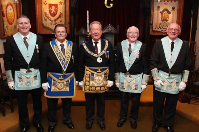 The Provincial Grand Master of Leicestershire and Rutland David Hagger (centre) along with the Master, Wardens and Secretary of The Rutland Lodge. Photo: Andy Green