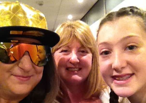 Melton woman and 'Honey G lookalike' Cath Gregory with X Factor contestant Honey G and daughter Abby backstage at the TV show EMN-161017-142014001
