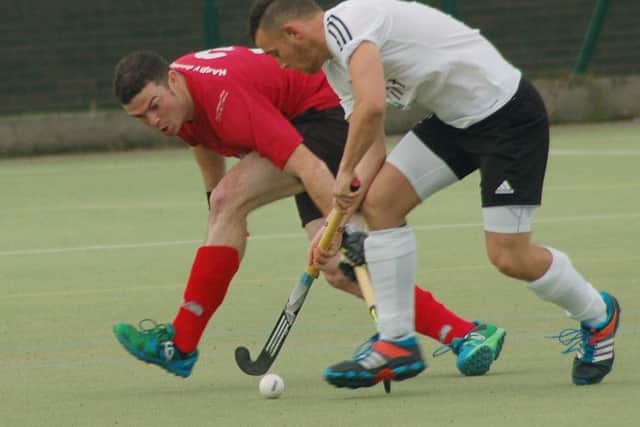 Sam Pollard gets in a challenge against Market Harborough EMN-161018-093329002