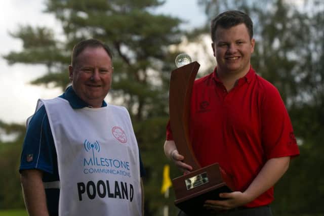 David with caddy and father Peter EMN-161018-115333002