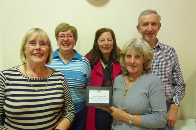Melton and Distrcit Flower Club members with their 'best in show' award PHOTO: Supplied