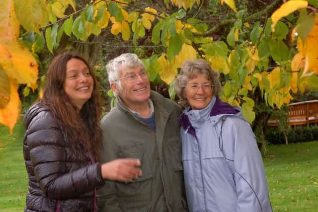 Horticultural expert Christina Moulton takes visitors Tony and Jane Hill for an autumnal tour of the garden PHOTO: Tim Williams
