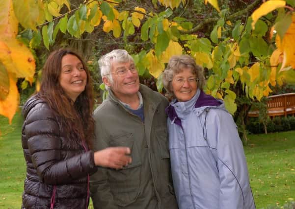 Horticultural expert Christina Moulton takes visitors Tony and Jane Hill for an autumnal tour of the garden PHOTO: Tim Williams