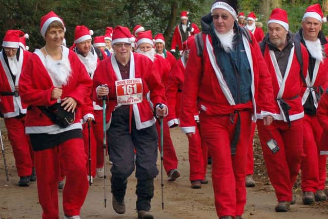 Charity walkers make their way through the Belvoir Castle grounds PHOTO: Tim Williams