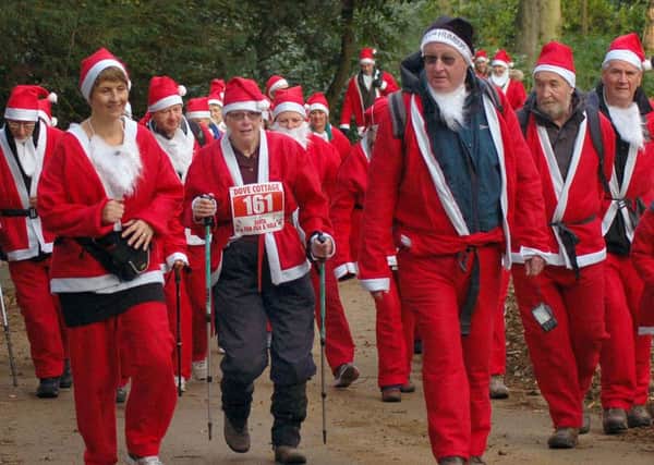 Charity walkers make their way through the Belvoir Castle grounds PHOTO: Tim Williams