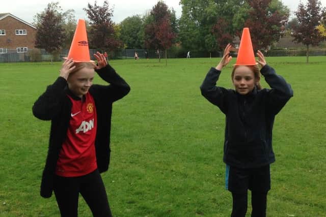 Pupils were asked to run with items of PE equipment EMN-161025-095635002