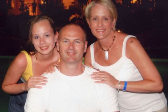 A holiday photo taken last year (2010) of Paul Fyfe with wife, Tracey, and daughter, Jessica EMN-160111-142952001