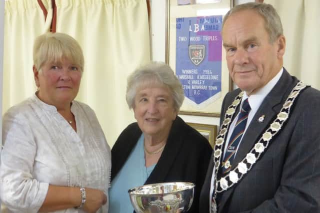 Melton Town Bowls Club chairman, and county president, David Ward with club person of the year winners Janet Evans (left) and June Bailey. Not pictured: Barbara Woodcock EMN-160211-084638002