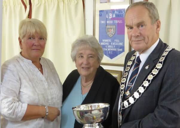 Melton Town Bowls Club chairman, and county president, David Ward with club person of the year winners Janet Evans (left) and June Bailey. Not pictured: Barbara Woodcock EMN-160211-084638002