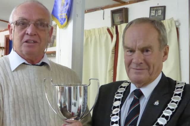 Melton Town Bowls Club chairman, and county president, David Ward with mens champion Harold Twigg EMN-160211-084649002
