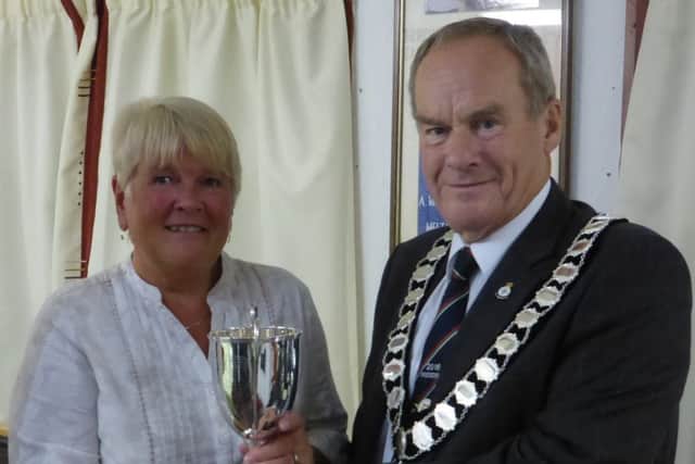 Melton Town Bowls Club chairman, and county president, David Ward with ladies' champion Janet Evans EMN-160211-084659002