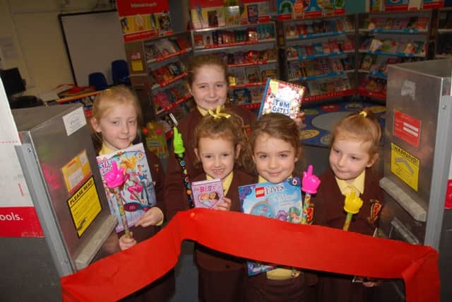 Competition winners open book fair PHOTO: Tim Williams