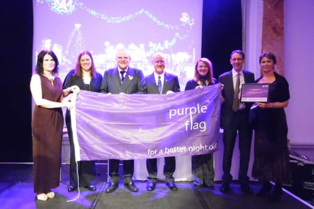 Melton Council members and officials celebrate the authority's Purple Flag award EMN-161115-143753001