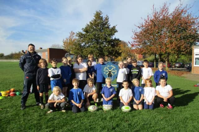 School pupils after playing in their first tag rugby sessionPHOTO: Supplied